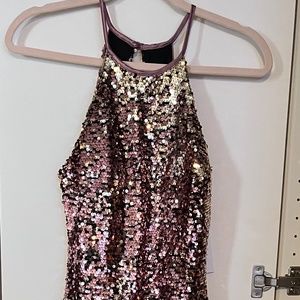 Mini cocktail dress in sequins rose and gold color.  Halter Size 5